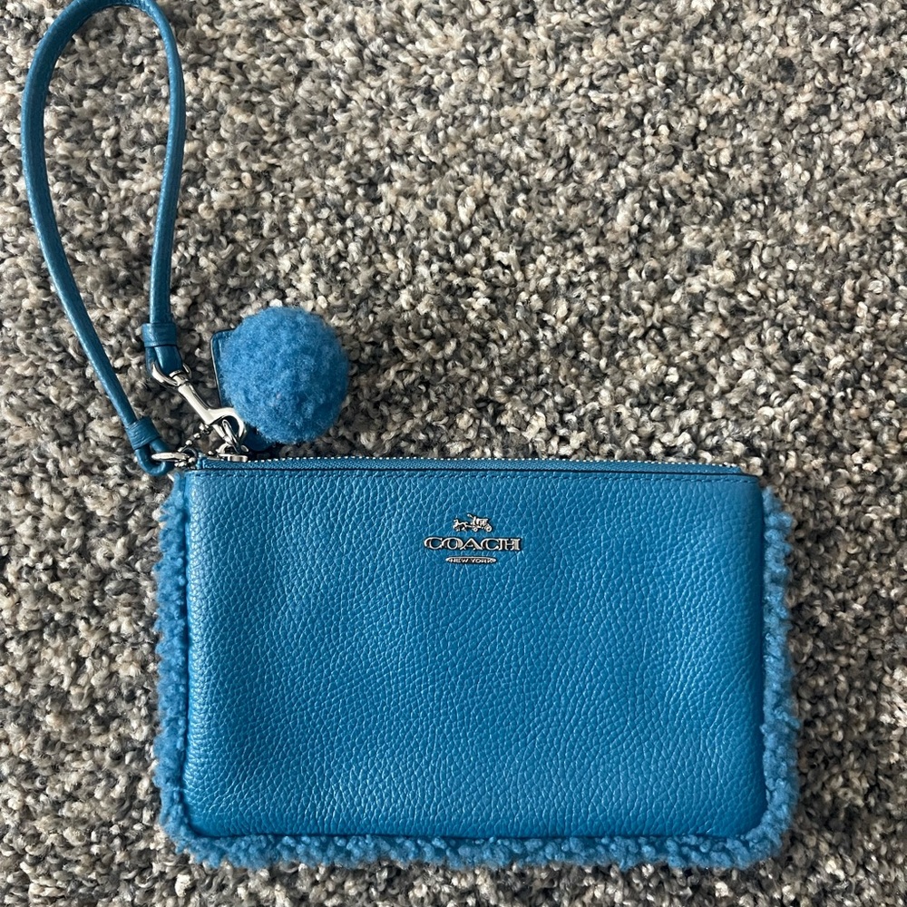 Coach Vibrant Blue Wristlet with Pom Pom